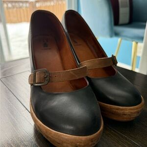 Fly London Black and Brown Mules